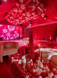 a room decorated with red and white decorations