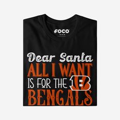 Superfans like you are all about dreaming big. That’s why the gift at the top of your list this season won’t fit in a stocking or even under the tree – A championship is a lot bigger than that. Make sure Saint Nick knows what you’re hoping for this holiday season by rocking this Cincinnati Bengals All I Want T-Shirt. This way, he knows you’re on the “nice” list. He won’t even have to check it twice. This top features a design that showcases your all-important team colors and a bold team logo dis Cute Bengals Sweatshirt, Cincinnati Bengals Shirt Ideas, Vintage Bengals Sweatshirt, Cincinnati Bengals Crewneck, Bengals Apparel, Saint Nick, Nice List, St Nick, Under The Tree