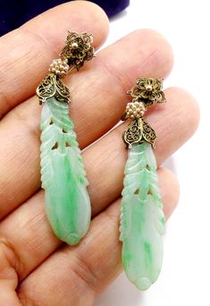 "Antique original Chinese gold over silver and mini seed pearl with carved jade drop screw back earrings, In good antique condition. Circa 1890's to 1900's. It's 2\" ¼ long 3/8\" wide. Weighs 6.9 gram. Thanks." Antique Pierced Drop Earrings, Victorian Engraved Drop Earrings, Antique Style Engraved Dangle Jewelry, Antique Green Drop Earrings, Antique Green Jewelry With Matching Earrings, Antique Engraved Jade Jewelry, Vintage Carved Jade Jewelry, Victorian Green Dangle Jewelry, Antique Green Carved Jewelry