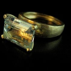 The Ring Made From 14 Karats Solid Yellow Gold. Ring Width From The Bottom Up 0.12x0.26inch/ 3x6.5mm. 1 Natural Aquamarine, 0.47x0.6inch/ 12x15mm. In The Last Pictures You Can See A Selection Of Large Stones. Beautiful Gold Ring Bezel Set With Aquamarine. It Could Be An Unusual Engagement Ring Or A Wonderful Gift For Women. If You Want To Change Something Diamond, Stone, Width, Personal Engraving, Or Anything Else. Please Contact Me, And We Will Build The Dream Ring You Want. Available In All Si Unique Gold Topaz Ring For Formal Occasions, Modern Gold Sapphire Ring With Hallmark, Modern Gold Solitaire Emerald Ring, Unique Yellow Gold Emerald Cut Jewelry, Unique Emerald Cut Yellow Gold Jewelry, Modern Gold Sapphire Ring, Unique Yellow Gold Topaz Ring For Formal Occasions, Gold Solitaire Sapphire Ring With Emerald Cut, Gold Emerald Cut Solitaire Sapphire Ring