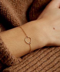 "Dainty Open Circle Bracelet gift, in 14k Gold Fill, Silver or Rose Gold. Beautiful hand-hammered finish. This subtle and dainty bracelet is the perfect gift to give to your loved ones. They'll never stop thanking you. :) D A I N T Y ∙ O P E N ∙ C I R C L E ∙ B R A C E L E T D E T A I L S * 100% 14k Gold Filled, Sterling Silver, or 14k Rose Gold Filled * All raw materials are USA sourced * Open circle charm is 11mm I T ' S ∙ A W E S O M E * Ethically Sourced, USA raw materials * Our lovely packa Rose Gold Round Bracelets In 14k Gold Filled, Minimalist 14k Gold-filled Round Bracelets, Minimalist 14k Gold Filled Round Bracelets, Minimalist 14k Gold Filled Round Bracelet, 14k Gold Filled Round Bracelets As Gift, Gold Circle Bracelets For Everyday, Minimalist Infinity Bracelet With Adjustable Chain, Adjustable Dainty Circle Bracelets, Dainty Adjustable Circle Bracelets