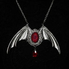 Immortal Necklace Limited Edition Beautiful vampire themed necklace with central red stone on bat wing base with hanging blood drop on a stainless steel chain.  Handmade to order; ready in 3-4 days. May take longer during busy times. Dracula Cosplay, Vampire Accessories, Necklace Vampire, Dracula Costume, Halloween Dracula, Vampire Necklace, Vampire Jewelry, Bat Jewelry, Blood Drop