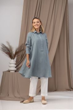 ❥ Linen tunic top in dark navy featuring cuffed sleeves, collar and front buttons. Soft touch of linen and effortless style. ❥ Enjoy the effortless fit and the feminine sense when wearing our creations! Every piece by NikkaPlace is made with lots of love and attention to detail! ❥ MATERIALS AND CARE Linen - 100% Linen Linen Blend - 70% Linen 30% Viscose Hand or machine wash separately, always with lukewarm or cold water and a mild soap without bleach or brighteners. Opt for a short and gentle cy Elegant Long Sleeve Tunic With Buttons, Casual Tunic With Button Closure For Daywear, Oversized Shirt Dress With Buttons, Casual Shirt Dress With Cuffed Sleeves And Spread Collar, Tunic Blouse With Buttons For Daywear, Long Sleeve Tunic With Placket For Work, Daywear Tunic Blouse With Buttons, Long Sleeve Tunic With Buttons For Work, Casual Long Sleeve Tunic With Placket