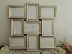 a group of six framed pictures sitting on top of a table next to a starfish