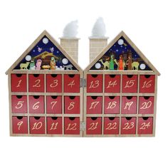 a wooden calendar with christmas scenes on it