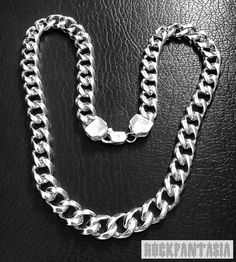 HEAVY AND WIDE CURB CUBAN MENS NECKLACE STERLING SILVER Material : Solid 925 Sterling Silver Weight 165 gr. (5.85 oz) (for 24 inches-61 cm) Width: 13 mm, Thickness: 5 mm We ship to worldwide by registered air mail, it usually takes 20-25 days to arrive, but sometimes it may takes about or more than 30 days(it may affected by post office, custom or weather, ect). Mens Chain, Mens Sterling Silver Necklace, Mens Necklace, Silver Chain Style, Men's Necklace, Necklace Sterling Silver, Silver Material, Exquisite Jewelry, Chains For Men