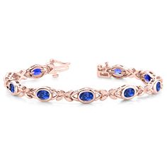 Product Information SKU TTBR1014 Metal Type Your choice: 14k, 18k Metal Color Your choice: White Gold, Yellow Gold, Rose Gold Bracelet Size 7.25 inches Primary Stone Gemstone Name Tanzanite No. Of Gemstones 9 Gemstone Shape Oval Gemstone Color Violetish Blue Gemstone Grade Your choice: AAAA Gemstone Clarity VVS Gemstone Total Carat Weight/ Size Your choice: 6.84 cttw, 7x5 mm Gemstone Composition Natural Gemstone Treatment Heated Gemstone Origin Tanzania Gemstone Species Zoisite Tanzanite Bracelet, Tanzanite Gemstone, Bracelet Style, Rose Gold Bracelet, Blue Gemstones, Metal Color, Gold Yellow, Bracelet Sizes, 18k Rose Gold