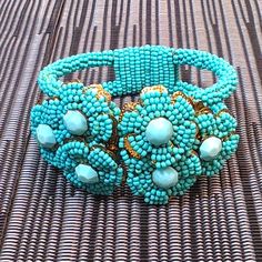 This Beauty Is A Rare Early 1930s Miriam Haskell Clamper Bracelet. Vintage Frank Hess Miriam Haskell Clamper Turquoise Bracelet With Beaded Flowers. Absolutely Beautiful Piece! **Not Eligible For The Bundle Discount! Fast Shipping!! Vintage Blue Beaded Bracelets With Round Beads, Vintage Turquoise Round Bead Bracelets, Vintage Blue Beaded Bracelets, Handmade Vintage Blue Beaded Bracelets, Light Blue Beaded Bracelet, Vintage Turquoise Beaded Bracelets, Handmade Blue Costume Jewelry Bracelets, Elegant Turquoise Bracelets With Large Beads, Elegant Turquoise Bracelet With Large Beads