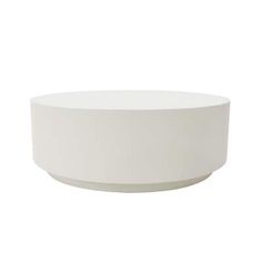 a white bowl sitting on top of a table