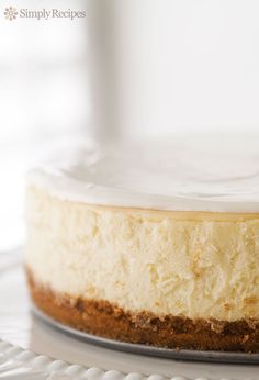 a cheesecake sitting on top of a white plate