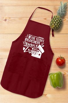 an apron with the words, i'm good to trust and two peppers next to it