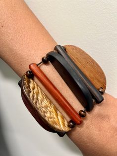 Beautiful handmade bracelets made of Cameroonian wood. This can be worn for any occasion to accentuate your entire look! We offer one of each shape: triangular, rectangular and semi-circular. The bracelet is elastic and fits all sizes. Please do not hesitate to contact me for any questions before your purchase. Brown Rectangular Bohemian Bracelet, Brown Bohemian Rectangular Bracelet, Bohemian Brown Rectangular Bracelet, Wedding Jewelry Bracelets, Wedding Bracelet, Handmade Bracelets, Bracelet Making, Wedding Jewelry, Bracelet