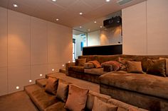 Hollywood Hills luxury home theater plush brown velvety couches. Party Room Basement, Playroom Ideas Basement, Rec Room Ideas Basement, Mancave Ideas Basement, Game Basement, Game Rooms Ideas, Movie Theater Design, Fun Basement Ideas