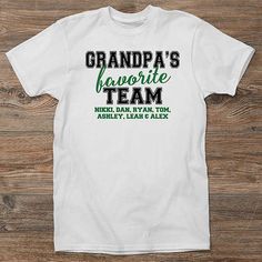 Personalized with any title and 3 lines of textChoose from multiple color options  Let your Grandpa proudly display his favorite team while wearing the Grandpa's Favorite Team Personalized Men's Shirt. Collegiate T-shirt With Name Print For Fans, Team Name T-shirt For Game Day On Father's Day, Game Day T-shirt With Team Name For Father's Day, Father's Day Game Day T-shirt With Team Spirit, Game Day Team Spirit T-shirt For Father's Day, Team Name T-shirt For Game Day, Football Season Fan Apparel T-shirt With Name Print, Father's Day Team Spirit Tops With Team Name, Father's Day Game Day Fan Apparel T-shirt