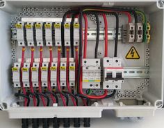 the inside of an electrical box with multiple wires