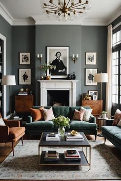 a living room filled with lots of furniture and paintings on the wall above it's fireplace