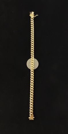 6.5mm All Shiny Mens Miami Cuban Bracelet Box Clasp Lock Real 10K Yellow Gold * Metal : Real 10K Yellow Gold, (Properly Stamped, 10K or 417) * Condition : Brand New * Finish : Polished * Weight : Apox 11.2 gram * Length : 8 inches * Width : 6.5mm * Clasp/Bail : Box Clasp Lock Bosphorusgold Cuban Link Chain Bracelet With Solid Link Construction, Luxury Curb Chain Bracelet, Cuban Link Box Chain Bracelet For Formal, Gift Cuban Link Gold Bracelet, Formal Cuban Link Necklace With Curb Chain, Formal Cuban Link Chain Bracelet, Yellow Gold Cuban Link Bracelet With Solid Construction, Cuban Link Curb Chain Necklace, Classic Cuban Link Bracelet With Gold Chain