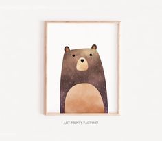 an art print with a brown bear on it's face in a wooden frame