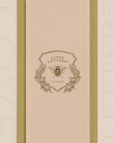 the front cover of a book with a bee on it