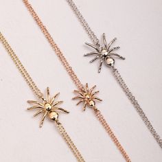 Elevate your style with our 14K 18K Solid Gold Spider Charm Bracelet. Featuring a intricately crafted tarantula charm on a double chain, this spooky yet elegant piece is perfect for Halloween or any occasion. A unique blend of quality and allure, making it an ideal gift for her. Material: Solid Gold (no gold-filled or gold plated) Karat: 14K (585), 18K (750) Available gold color: Yellow, rose, and white Available Spider Width: 9mm, 12mm Chain type: Cable Chain thickness: 0.84mm 5.0 - 5.5 inch bracelet (X-Small) 6.0 inch bracelet (Little Girl) 6.5 inch bracelet Teen - Petite) 7.0 inch bracelet (Adult - Small) 7.5 inch bracelet (Adult - Medium) 8.0 inch bracelet (Adult - Large)  M o r e * F r o m * U s  Goldstore Jewelry - https://etsy.me/3gHtcrZ * Urn Necklaces - https://etsy.me/2Asb4BM * B Adjustable Gold Jewelry For Halloween, Halloween Novelty Jewelry Bracelet, Halloween Novelty Bracelet, Gold Novelty Jewelry For Party, Adjustable Gold Bracelets For Halloween, Themed Gold Jewelry For Party, Halloween Bracelet Jewelry Gift, Double Chain Bracelet, Mama Necklace