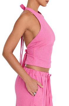 Cut in a cool cropped silhouette, this rose-hued halter top is crafted from a crisp linen blend. Adjustable back tie closure Halter neck Lined 70% linen, 30% cotton Dry clean Imported Invisible Bra, Backless Top, Halter Tops, Free Fabric, Anniversary Sale, Wide Leg Trousers, Halter Neck, Halter Top, Linen Blend