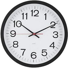 a black and white clock with numbers on the face is showing eleven o'clock