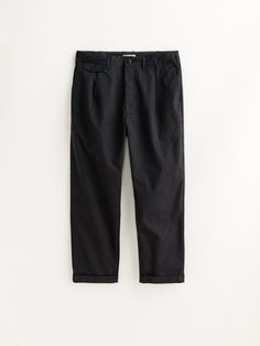 For our pleated chino we created a proprietary wash that combines the sturdiness of a dry military chino with a slightly broken-in feel. Front pleats Signature "A" button Gusset at the crotch for ease of movement Cropped so it hits higher on the leg For anyone 5’9" and under, we suggest ordering the regular inseam (28"). For anyone taller than 5'9", we suggest ordering the long inseam (30") Relaxed fit. Sits below natural waist Torin is 6'1.5" and wearing a size 32 Size 32 measures 34.5" around Pleated Pant, Alex Mill, Recycled Denim, Work Jackets, Pleated Pants, Short Jumpsuit, Mens Trousers, Chinos Pants, Uniqlo