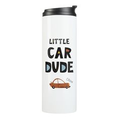 a white travel mug with the words little car dude on it and a brown car