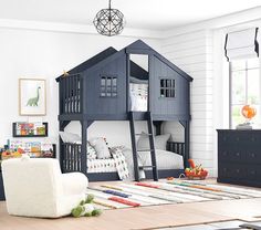 a child's bedroom with bunk beds and furniture