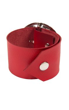 Extravagant Red Wristband - METBR4A A great everyday bracelet in a vivid red color and with a statement metal holder. This wide bracelet is very easy to wear and will be a great accent on a black outfit and will make it stand out even more. It has two snap buttons for closure as well as belt loops for the metal holder. This band is about 12 inches / 31 cm long and about 2 inches / 5 cm wide. This bracelet is made of 100% genuine leather. The item cannot be custom made. NOTE! Since every piece is Trendy Red Bracelets For Everyday, Adjustable Red Cuff Bracelet As Gift, Adjustable Red Bracelets, Trendy Red Adjustable Leather Bracelet, Adjustable Red Bracelet With Leather Strap, Adjustable Red Artisan Cuff Bracelet, Luxury Red Leather Bracelets, Red Adjustable Leather Bracelet, Adjustable Red Leather Strap Bracelet