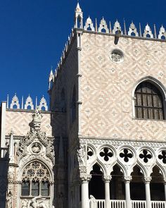 an ornate building with many windows and arches