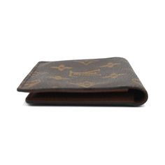 Louis Vuitton bi-fold wallet in brown monogram coated canvas with two clear card slots on the brown leather lined interior. Brand = Louis Vuitton Condition = 7/10, Good, light wear to glue trim, light scratches and discolouration to clear slots Dimensions = 4.5" x 3.5" x 0.5" Material = Coated Canvas SKU = 22709-1772 Luxury Brown Card Holder With Coin Pocket, Classic Monogram Canvas Wallet For Business, Designer Brown Bifold Card Holder, Classic Rectangular Wallet In Monogram Canvas, Designer Brown Bifold Wallet, Classic Rectangular Monogram Canvas Wallet, Designer Brown Wallet With Interior Card Slots, Designer Brown Card Holder For Formal Use, Designer Brown Card Holder For Formal Occasions