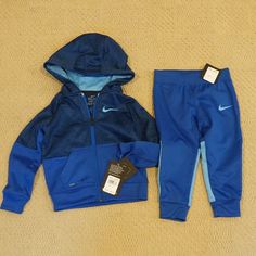 Brand New With Tags. Blue Hooded Tracksuit With Pockets, Blue Cotton Hooded Tracksuit, Blue Hooded Cotton Tracksuit, Blue Winter Activewear With Pockets, Winter Blue Activewear With Pockets, Blue Hooded Tracksuit For Sports, Blue Long Sleeve Sportswear Sets, Nike Blue Activewear For Winter, Nike Sporty Winter Sets