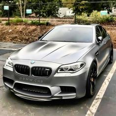 a silver car parked in a parking lot