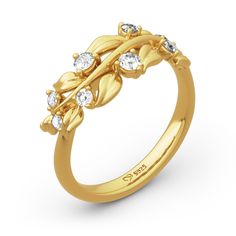 a yellow gold ring with leaves and diamonds