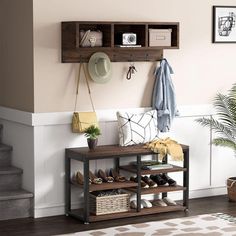 the entryway is clean and ready to be used as a shoe storage area for shoes