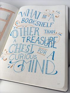 an open notebook with hand lettering on the page and a pen next to it that says, what is a bookshelf than other than a treasure chest for a priest for a curious mind