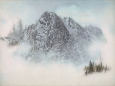 a mountain covered in snow and surrounded by trees on a foggy day with low clouds