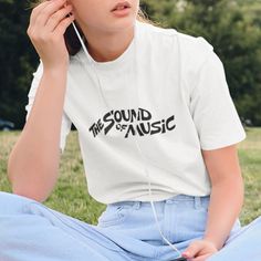 New! The Sound Of Music T-Shirt In White. Mens/Unisex Cut And Sizing For Comfortable Fit. 100% Cotton. Crew Neck. Short Sleeves. White Color Tee With Black Design. Tags # Style With Words Sayings Lyric Retro Movie Guys Mens Womens Teens Urban Outfit Casual Classic Unique Custom Bold Cool Handmade Heavyweight Essential Basic Cheap Music-themed Fan Merchandise Shirt, White Music-themed Crew Neck T-shirt, Casual Logo Print T-shirt For Music Festivals, Casual T-shirt With Logo For Music Festivals, Music-themed White Relaxed Fit Top, White Casual Top With Band Logo, Casual White Top With Band Logo, Hip Hop Crew Neck T-shirt For Music Festival, White Band Logo Short Sleeve T-shirt