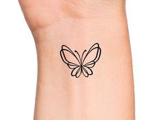 Butterfly Line Temporary Tattoo Size: The size of this Temporary Tattoo is approximately 1 inch in length. If you would like this design in a smaller or larger size that isn't listed, please message me on Etsy and I would be more than happy to accommodate you. Directions: 1. Cut excess paper around tattoo with scissors to eliminate any unnecessary adhesive on your skin after applying. 2. Peel away and discard the clear plastic layer. 3. Apply the tattoo image side to your skin and cover with a d Small Fine Line Butterfly Tattoo, Side Butterfly, Butterfly Wrist Tattoo, Butterfly Outline, Tattoo Butterfly, Butterfly Designs, Simple Butterfly, Pretty Tattoos For Women, Tattoo Bracelet