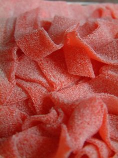 some sugar is sitting in a bowl on the table and it looks like something out of space