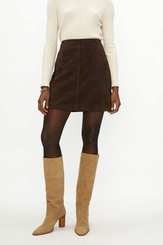 Style: Mini SkirtFabric: Fancy FabricLength: Mini Autumn Outfits Brown Skirt, Brown Leather Mini Skirt Outfit Winter, Go Go Boots Outfit 70s, Corduroy Skirt Outfit Fall, Brown Corduroy Skirt Outfit, Brown Suede Skirt Outfit, Corduroy Skirt Outfit Winter, Suede Mini Skirt Outfit, Cord Skirt Outfit