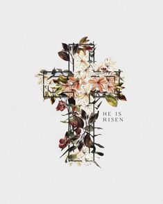 a cross with flowers on it and the words he is risen