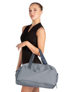 This amazing utility duffle has it all- roomy fully lined inside compartment in addition to a separate side entry pocket for shoes or wet items. Additional exterior pockets make organizing your dance gear a breeze. DANZNMOTION All In One Dance Duffle Bag Grey B24512 Tropical Dance, Duffle Bag Pink, One Dance, Dance Gear, Bags For Kids, Relaxing Yoga, Discount Dance, Dance Movement, Dance Bag