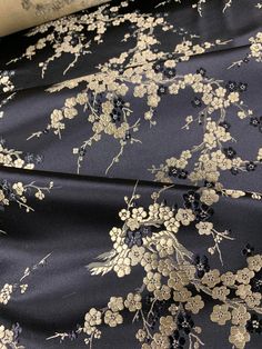 Black & Gold Cherry Blossoms Floral - Silk Brocade Fabric Silk/rayon brocade Elegant Brocade Fabric With Gold Embroidery, Luxury Elegant Brocade Embroidered Fabric, Luxury Black Embroidered Fabric With Motifs, Luxury Embroidered Brocade Fabric, Luxury Black Embroidered Fabric With Floral Design, Silk Brocade Fabric, Plum Wine, Silk Velvet Fabric, Gold Brocade