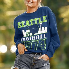 This Vintage, Seattle Football sweatshirt is perfect to root on the Seattle Seahawks this football season! Available in white, sport grey, heather grey, black, or navy. Grab one for your boyfriend/husband/best friend/mom/dad etc to match! Ideal for any situation, a unisex heavy blend crewneck sweatshirt is pure comfort. These garments are made from polyester and cotton. This combination helps designs come out looking fresh and beautiful. The collar is ribbed knit, so it retains its shape even af Long Sleeve Tops For Sports Events, Sporty Crew Tops For Football Season, School Spirit Long Sleeve Tops For Football Season, Sports Fan Long Sleeve Tops For Streetwear, Fall Sports Fan Sweatshirt With Crew Neck, Casual Crew Tops For Football Season, Casual Sweatshirt For Sports During Football Season, Casual Crew Neck Top For Football Season, Crew Neck Letter Print Sweater For Sports Season