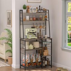 a shelf with coffee cups and other items on it next to a couch in a living room