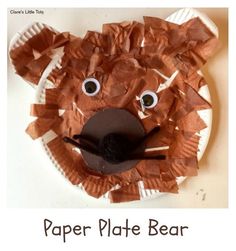 the paper plate bear is made to look like it has been cut out