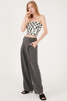 Nova Wrap Front Wide Leg Pants Front zip fly with button closure Wrap effect style Front slant pockets * Product Specification 100% Polyester * Flat Measurement: S/M: Waist: 31.5cm (12.4in) / Hip: 41.5cm (16.3in) / Thigh: 28.5cm (11.2in) / Rise: 34.8cm (13.7in) / Hem: 23.4cm (9.2in) / Length: 102.2cm (40.2in) / * Professional Clean Only / Do Not Tumble Dry Model's height is 5??7??(175cm) Bust 33in Waist 23in Hip 34in and wearing S/M 사이즈 정보Size information (단위:cm)(Unit : inch) FREES/M 사이즈 정보 Size Fitted High-waisted Cargo Pants With Button Closure, Versatile High Waist Bottoms With Buttons, High Waist Summer Pants With Button Zip Fly, High Waist Pants With Button Zip Fly For Summer, Fitted High Waist Cargo Pants With Button Closure, Chic High Waist Pants With Button Zip Fly, Chic Trousers With Button Zip Fly, Chic High-waisted Bottoms With Zip Fly, Harem Pants