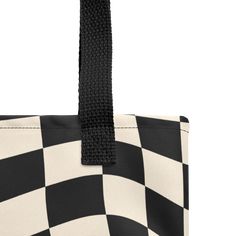 Step up your style game with Goth Cloth Co.'s spacious and trendy tote bag, featuring a retro wavy checkered black and cream pattern. Perfect for carrying everything that matters, this tote bag is made from 100% spun polyester fabric and has sturdy dual handles crafted from natural cotton bull denim. With a generous capacity of 2.6 US gallons and a maximum weight limit of 44 lbs, it’s both functional and fashionable. Add a touch of retro flair to your everyday look with this unique tote! Key Fea Black Retro Canvas Bag For Travel, Retro Black Canvas Bag For Travel, Retro Black Canvas Travel Bag, Retro Black Canvas Bag For Daily Use, Checkered Tote Bag, Trendy Tote Bags, Trendy Tote, Black And Cream, Printed Tote Bags